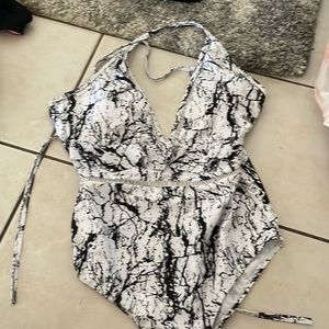 Maybe bathing suit never worn!